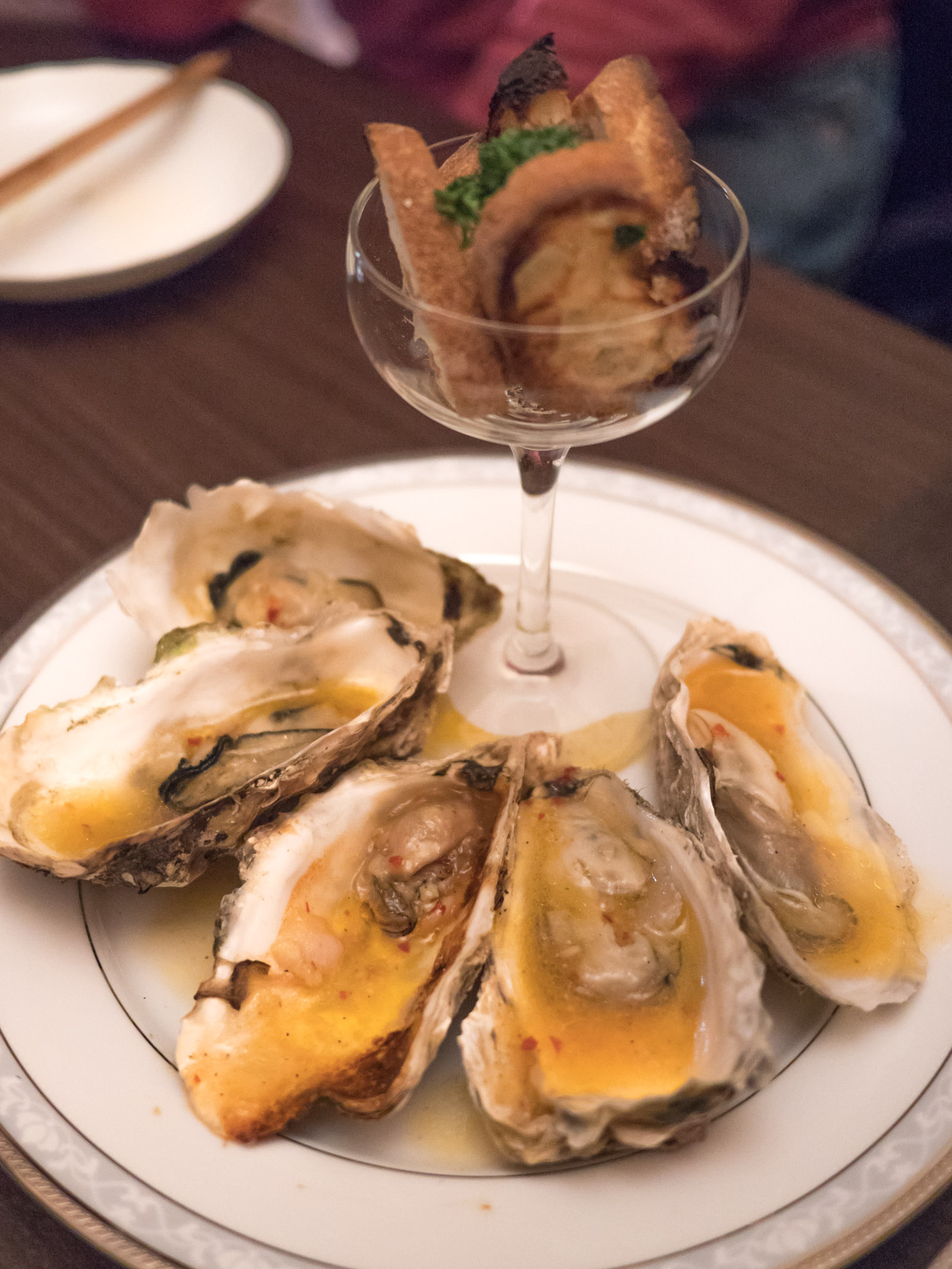 函館「牡蠣人（かきんちゅ)」宴会コースの3の皿　牡蠣のアヒージョ